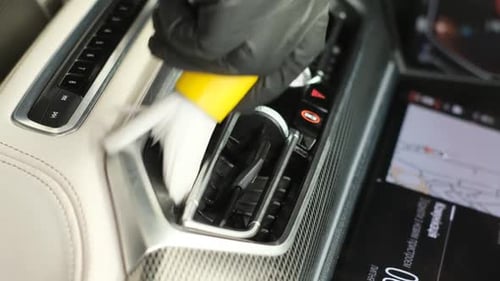 An Employee of the Detailing Center Drycleans a Car Professional Cleaning of the Car Vertical