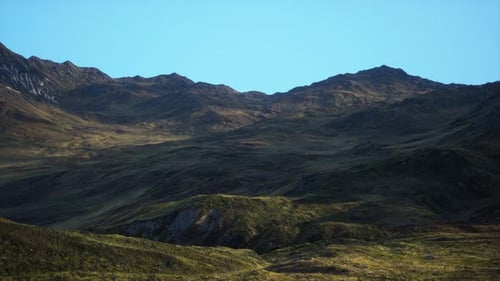 A Breathtaking Panoramic View of Majestic Mountain Peaks in the Distance