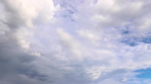 Time Lapse of Cumulus Clouds Passing in Blue Sky
