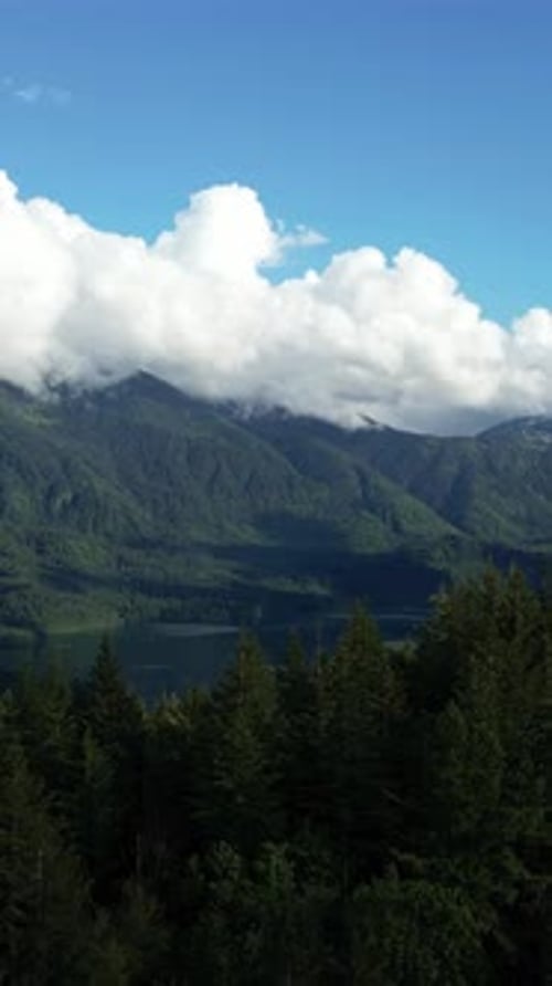 Mountain Lake View With Clouds, blue sky. British Columbia, Canada.