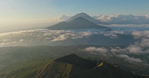 Famous volcanoes of Bali tropical island, Batur, Abang and Agung, aerial