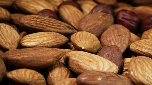 Pile of Almonds and Hazelnuts Macro Close Up