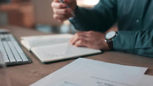 Business person, hands and writing in notebook for planning, brainstorming