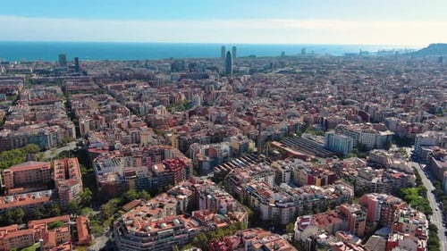 Aerial view of Barcelona city skyline at sunset, Horta-Guinardo district, Agbar Tower, Catalonia