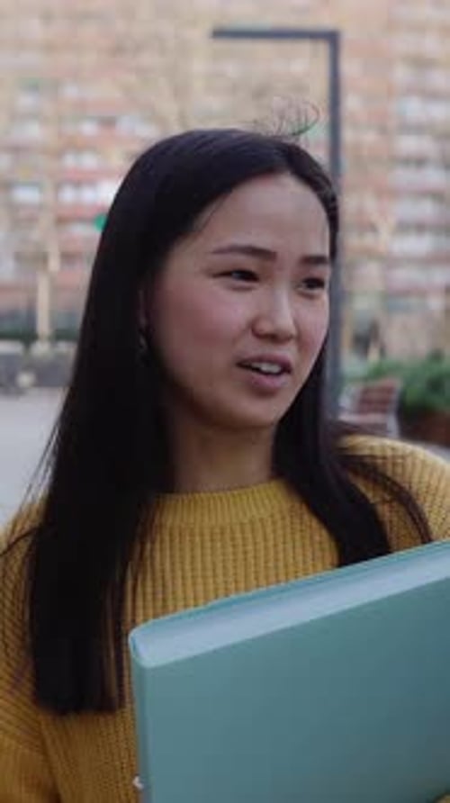 Young Asian Student Friends Talking at College Campus