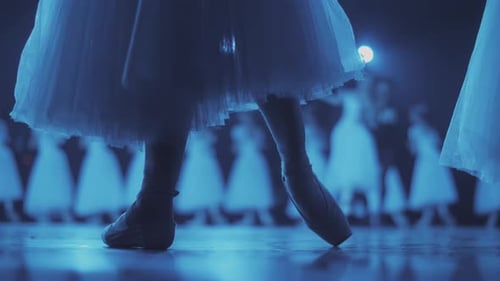 Close up of a ballet dancer's feet as she corrects pointe on the stone embankment. Woman's feet in.