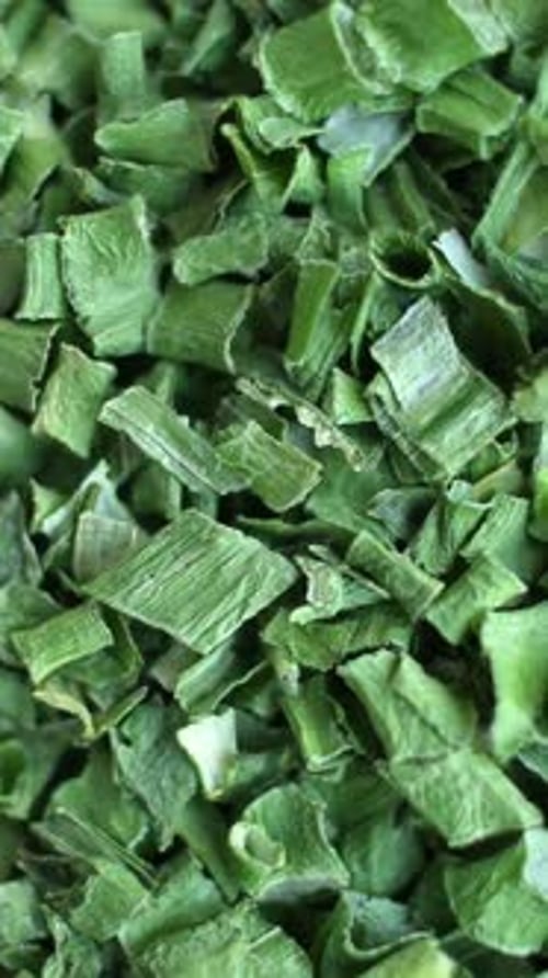 Background of Dried Green Onions Spices Close Up Rotating Vertical Video