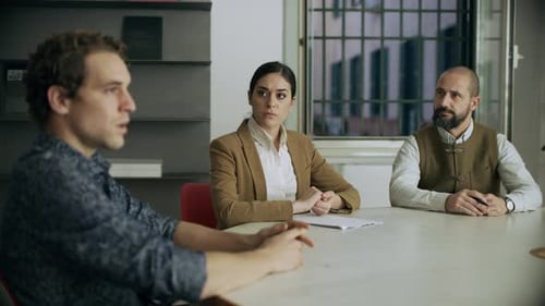 Serious Business Meeting with Colleagues in Office