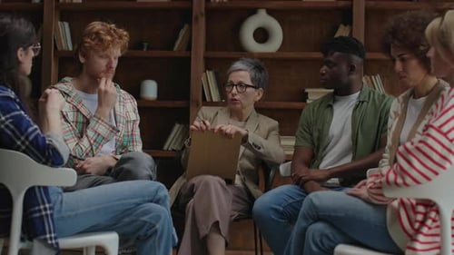 Supportive Circle Group of Six Engage in Therapeutic Session