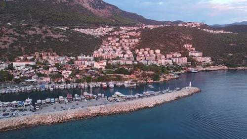 Aerial The Sea Coastal City on the Rocky Coast at Sunset