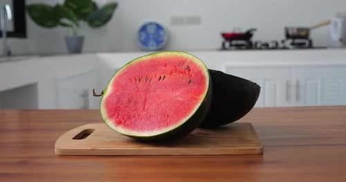 Steadicam Shot Two Halves of a Wholesome Ripe and Juicy Bright Red Organic Sweet Watermelon with a