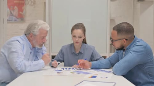 Data Analysis Team in Office Meeting