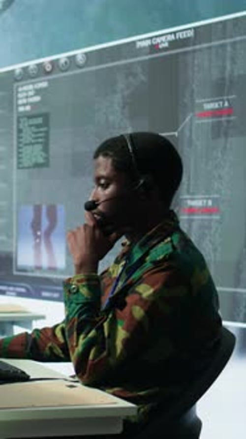 Vertical Video Army Professional in Uniform Works in a Mission Control Center