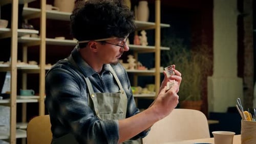 Designer Male Guy Caucasian Man Decorator Artist Painter Looking Choosing Colors Art Studio