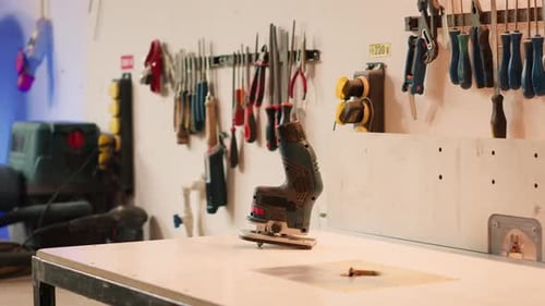 Close Up of Electric Router on Wood Shaper in Carpentry Studio
