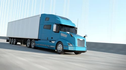 Blue Semi Truck Driving on a Highway during Daytime