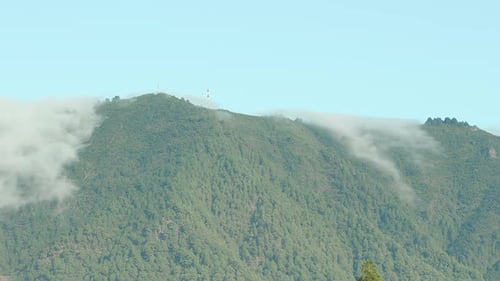 Lush Green Mountain with Clouds