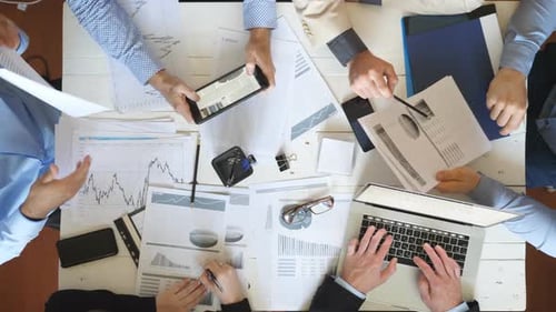 Top View Male and Female Hands of Business People Planning Strategy for Corporate Project in Office
