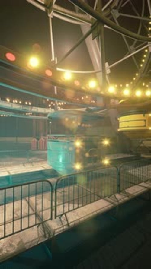 Illuminated Deserted Amusement Park at Dusk