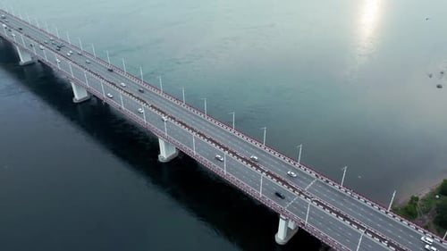 Top View of Cars Drive Along Road Surrounded By Waters Irrl