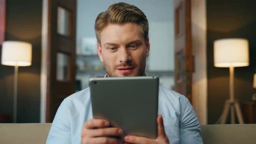 Inspired Businessman Reading Tab Home Zoom on Laughing Man Tablet Funny Video