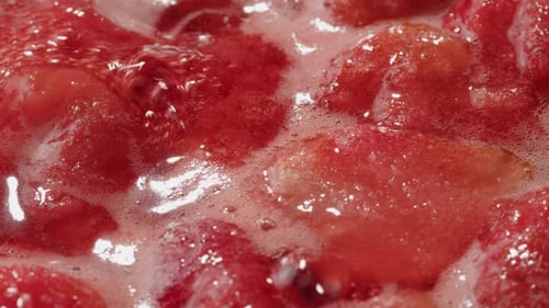 Cooking Fruits Jam Process of Making Homemade Strawberry Jam Red Sweet Syrup Boiling on the Stove