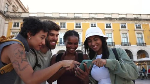 Tourists using smartphone app in lisbon, portugal