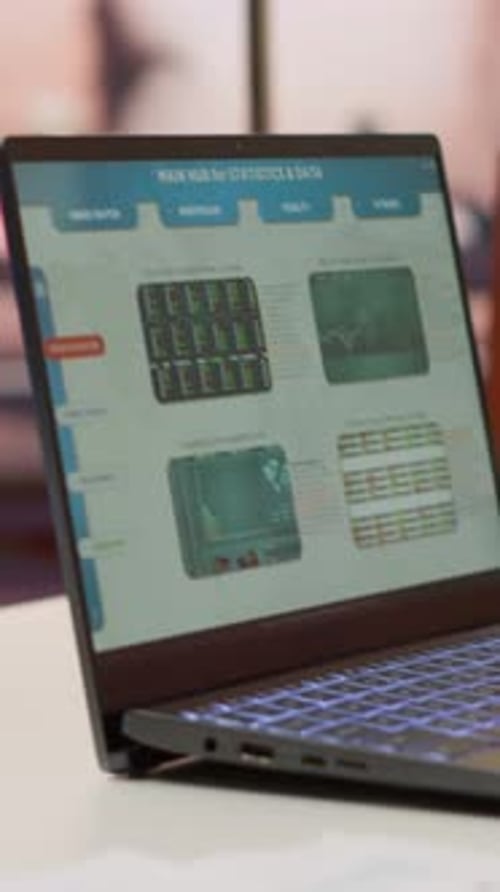 Vertical Video Empty Home Office with Tablet and Laptop Shows Infographics and Accounting Data