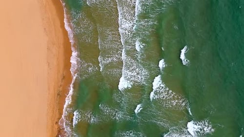 The Beach Displays a Serene Landscape with Golden Sands Calming Waves Italy