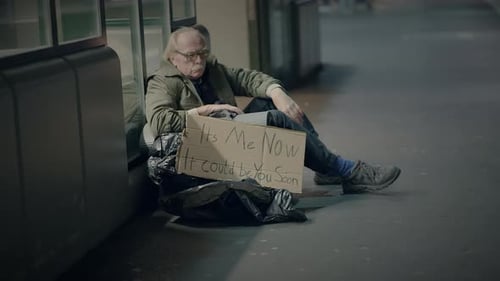 Elderly Homeless Man Suffering From Poverty Looking for Help at Train Station