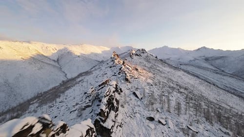 Snowy Mountain Range Aerial View in Winter