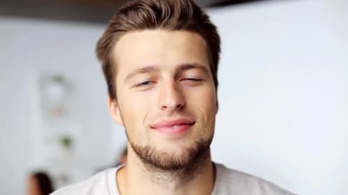 People, Emotion and Facial Expression Concept - Face of Happy Smiling Young