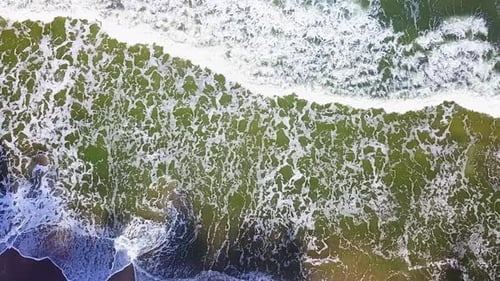 Ocean Waves Slomotion Top Down Aerial View.