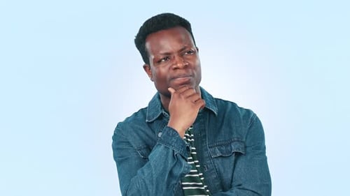 Thinking, black man and ideas with doubt, solution and problem solving on a blue studio background