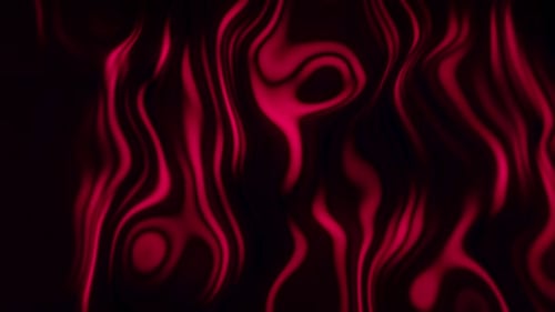 Des flux mobiles de stries de peintures colorées sur un fond abstrait sombre