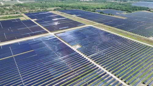 Aerial View of Large Sustainable Electrical Power Plant with Rows of Solar Photovoltaic Panels for