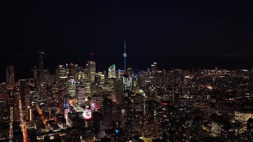 Luminous Cityscape of Toronto at Night Downtown Skyscrapers and Iconic CN Tower with Traffic and