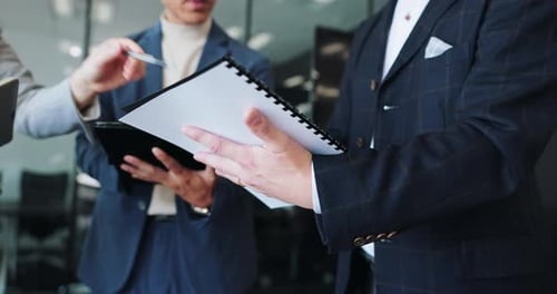 Business, people and meeting with documents in office for planning project