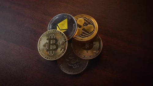 Crypto Currency Coins on a Wooden Table Top