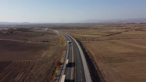 Aerial View of Highway Road at Sunset in Autumn