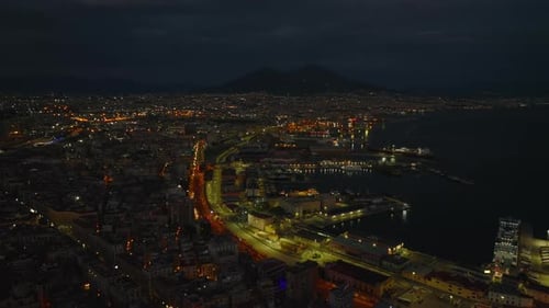 Aerial View of City Harbour and Surrounding Urban Boroughs at Night