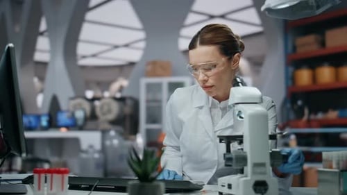 Woman Scientist Working in a Lab