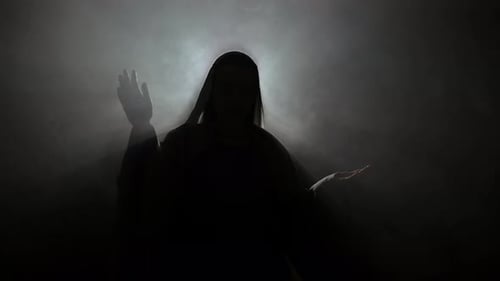 Mysterious Dark Figure in Ethereal Mist