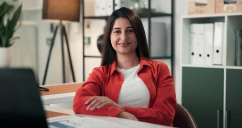 Face of woman, confident and smile in creative agency, career growth and professional