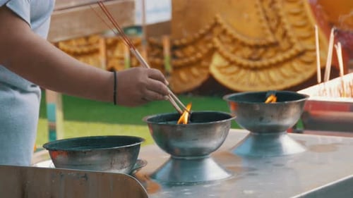 People Light Incense Sticks with Smoke in Buddhist Temple Thailand Pattaya