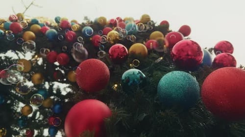 Colorful Christmas Ornaments on Festive Tree Close Up