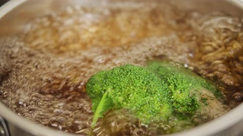 Professional Restaurant Kitchen Green Broccoli Boiling in Water Closeup Healthy Organic Vegetable