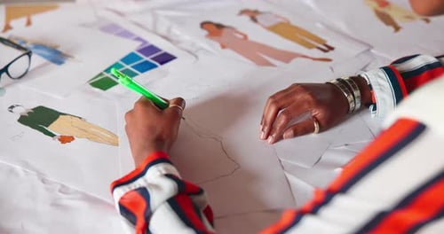 Designer Draws a Fashion Sketch at the Workplace