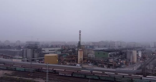 Wide Track of Rail Yard And Industrial Zone Appearance of Polluted Sky