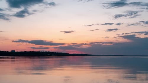 Reflective Water During Golden Hour at Sunset